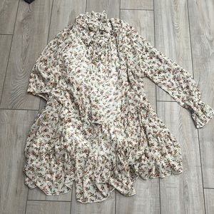 White floral dress. Comes with slip. Front tie closure. Like new. No damage.
